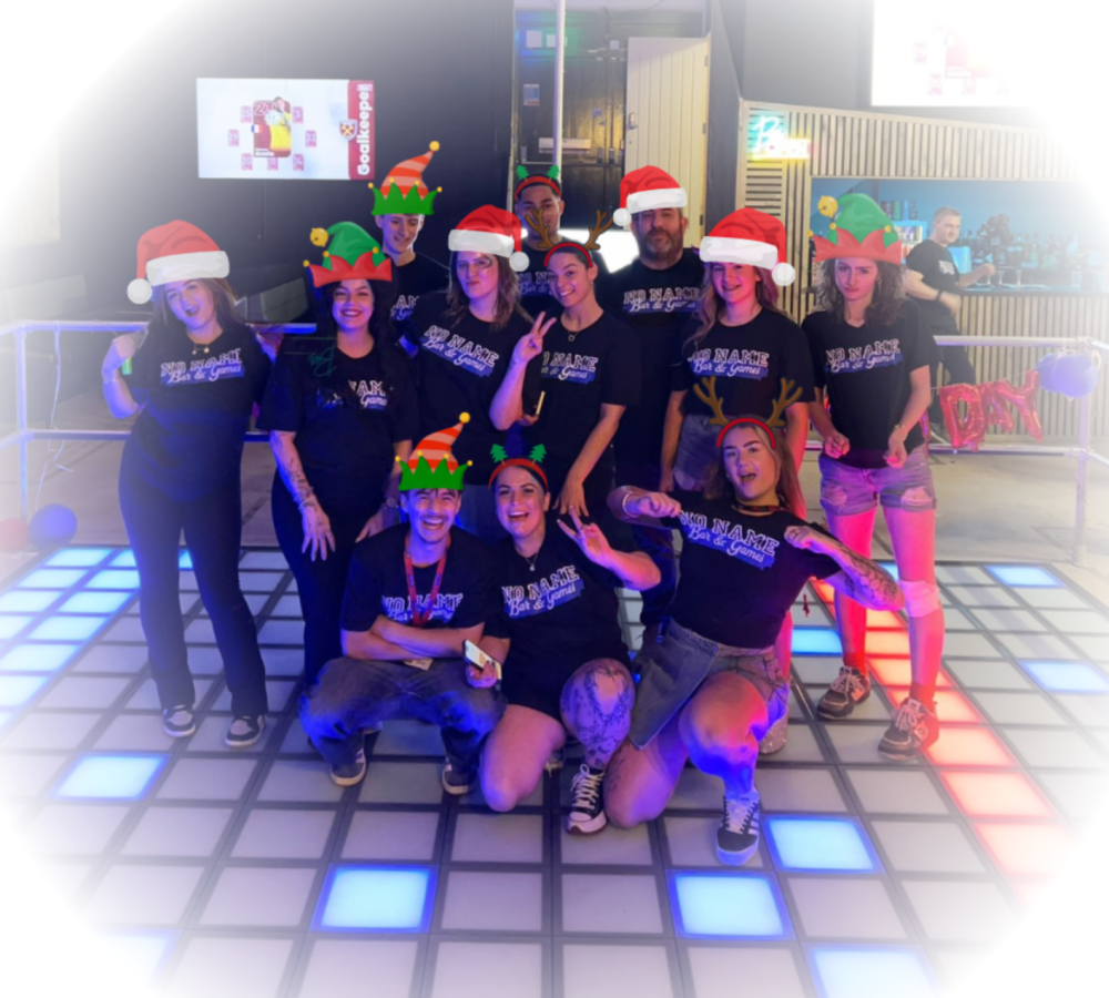 Christmas staff photo at no name bar and games